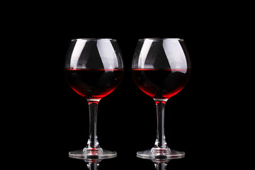 Wineglasses isolated on black