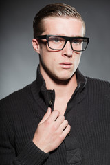 Fototapeta premium Fashion beauty portrait of young man with retro glasses.