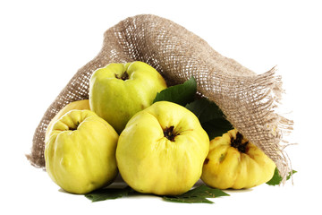 sweet quinces with leaves, isolated on white