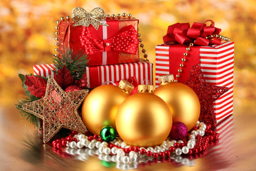 Christmas decoration and gift boxes on golden background