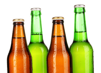 Coloured glass beer bottles isolated on white