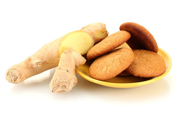 Ginger cookies with fresh ginger root isolated on white