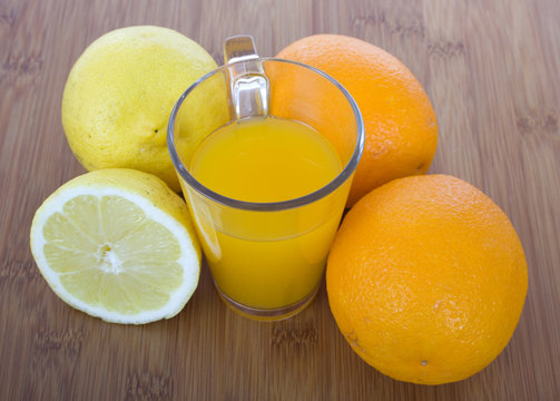 glasse of orange juice and fruits