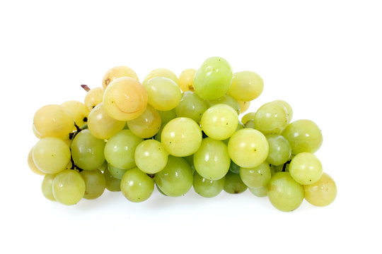 green grapes close-up on a white background
