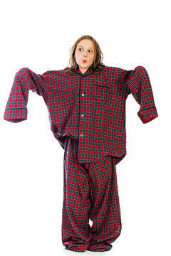 kid wearing huge over sized pajamas