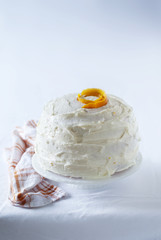 White Frosted Cake with Blue Tones