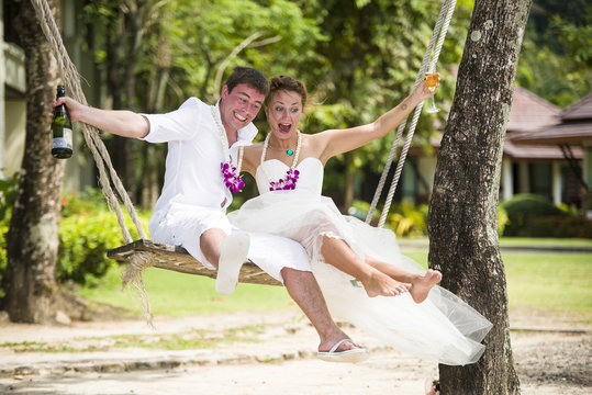 happy couple get married on the beach in Thailand
