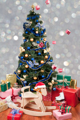 Christmas - Decorated christmas tree with lots of gifts and toys