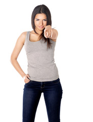 Portrait of a beautiful young woman pointing at you