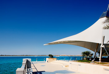 The searing heat of the midday sun leaves the Corniche deserted