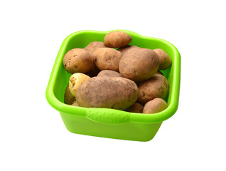 Barreño con patatas rojas.