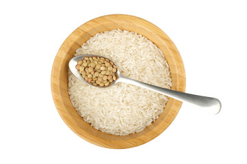 wood bowl with rice and steel spoon with lentil