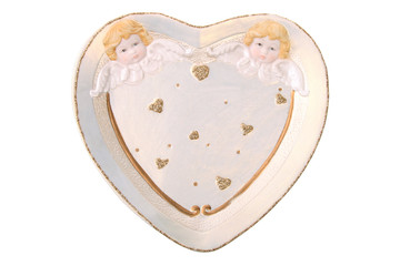 Plate in the shape of a heart with angels