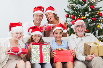 Family exchanging christmas presents