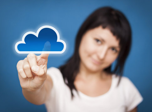 Woman accessing cloud computing system.