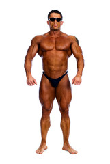 Muscled male model posing in studio