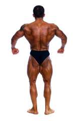 Obraz premium Muscled male model posing in studio