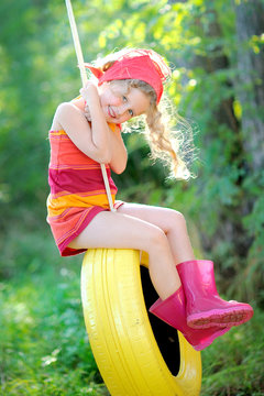 portrait of little girl outdoors in summer