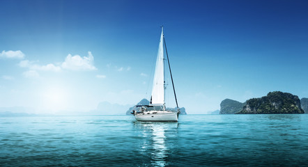 yacht and blue water ocean