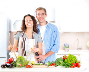 Happy Couple Cooking Together. Dieting. Healthy Food