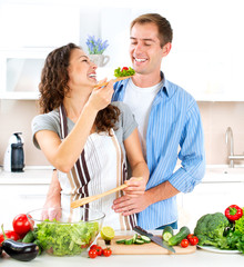 Happy Couple Cooking Together. Dieting. Healthy Food