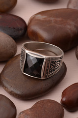 silver ring on small natural stones