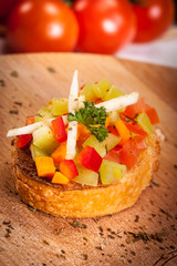 italian bruschetta with red and yellow peppers