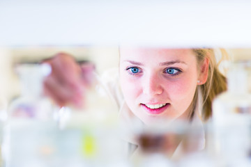 Portrait of a female researcher  in a chemistry lab
