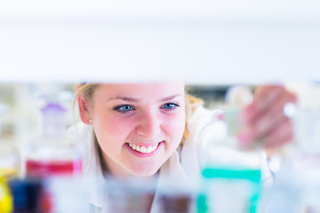 Portrait of a female researcher  in a chemistry lab