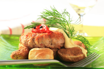 Burger and baked potatoes