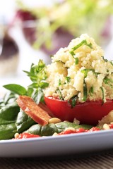 Couscous stuffed tomato