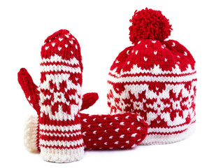 winter cap and mittens hand knitted, isolated