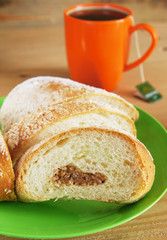 Fresh bun and cup of black tea for lounch