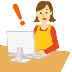 パソコンをする主婦