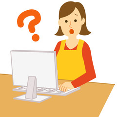 パソコンをする主婦