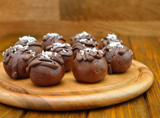 Chocolate cakes on a brown background