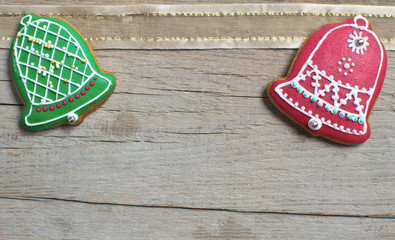 Christmas homemade gingerbread cookies over wooden table