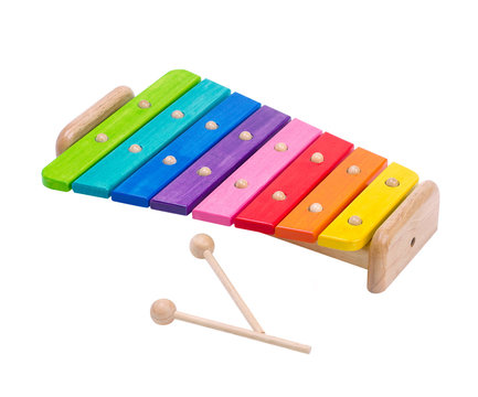 Wooden rainbow colors xylophone toy isolated on white