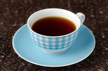 A cup of black tea horizontal
