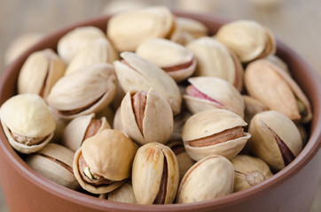 close up of a bowl of pistachio nuts