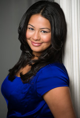 Attractive young hispanic smiling woman portrait.