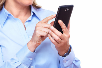 Hands of woman with a smartphone.