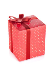 Red gift box with ribbon and bow