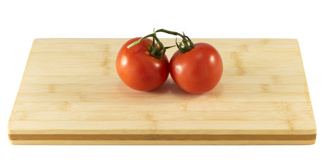 Tomatoes on chopping board