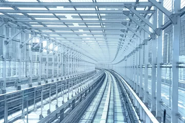 Schilderijen op glas Tokyo monorail transportation system line metal tunnel. Blue ton © stevanzz