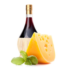 Red wine bottle and  cheese still life