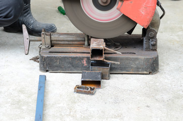 Steel with machine for cutting steel.