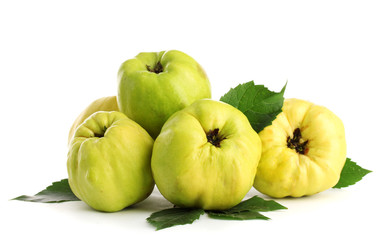 sweet quinces with leaves, isolated on white