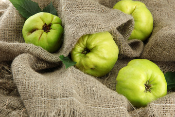 sweet quinces, on burlap background