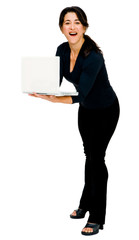 Happy woman using a laptop